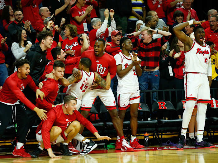 Rutgers basketball players celebrate